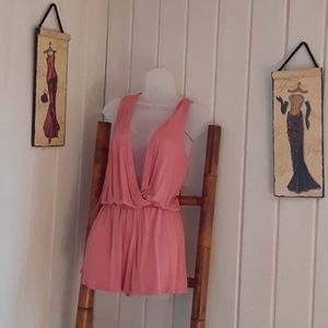 Rumper size is small but it will fit a large